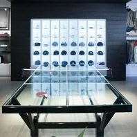 Travis-Mathew-Ping-Pong-Glass-Table-Gear-Patrol