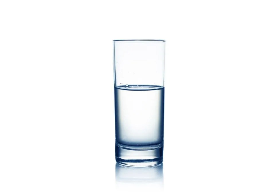Empty,half and full water glasses . Isolated on white