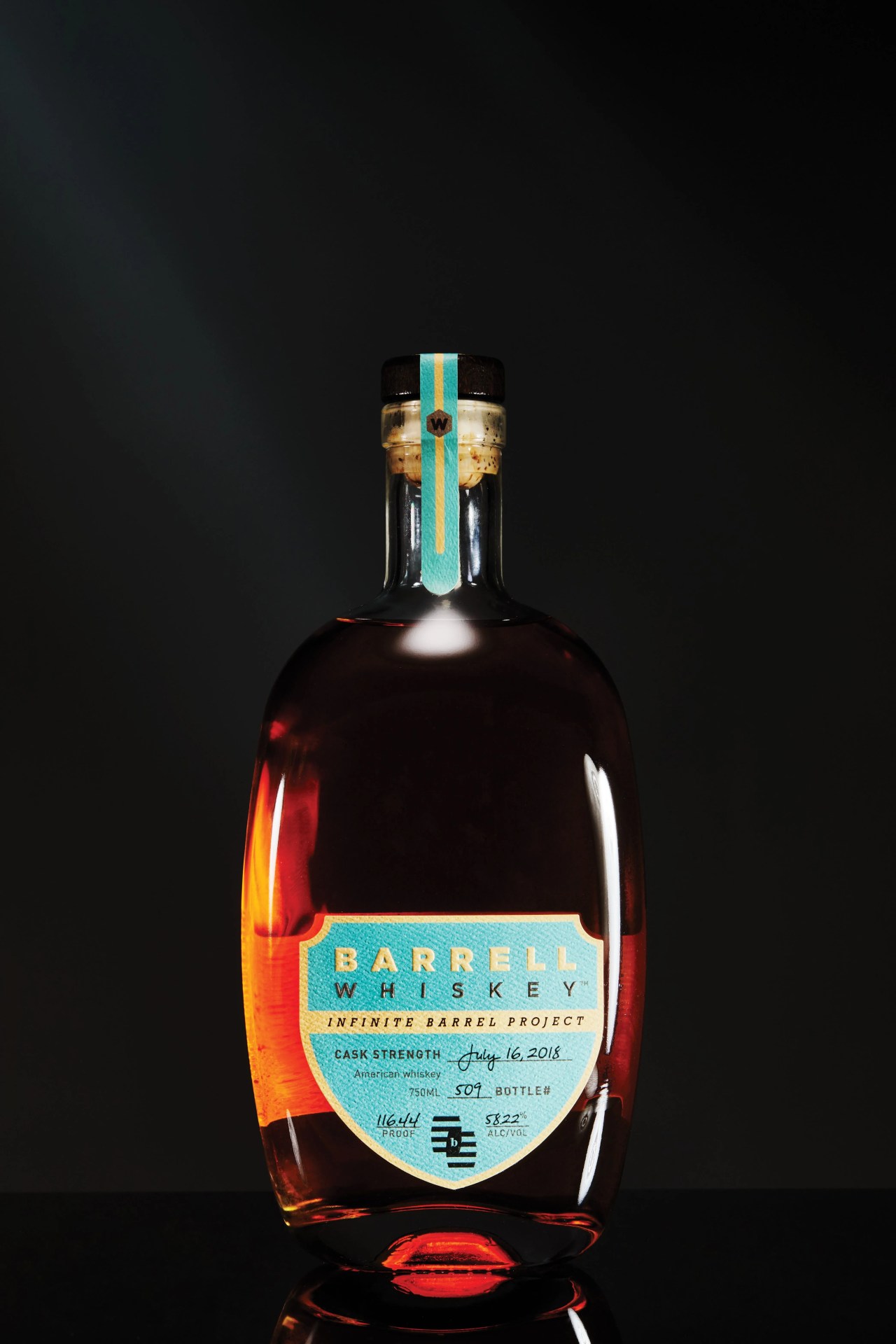 barrell whiskey bottle with blue label