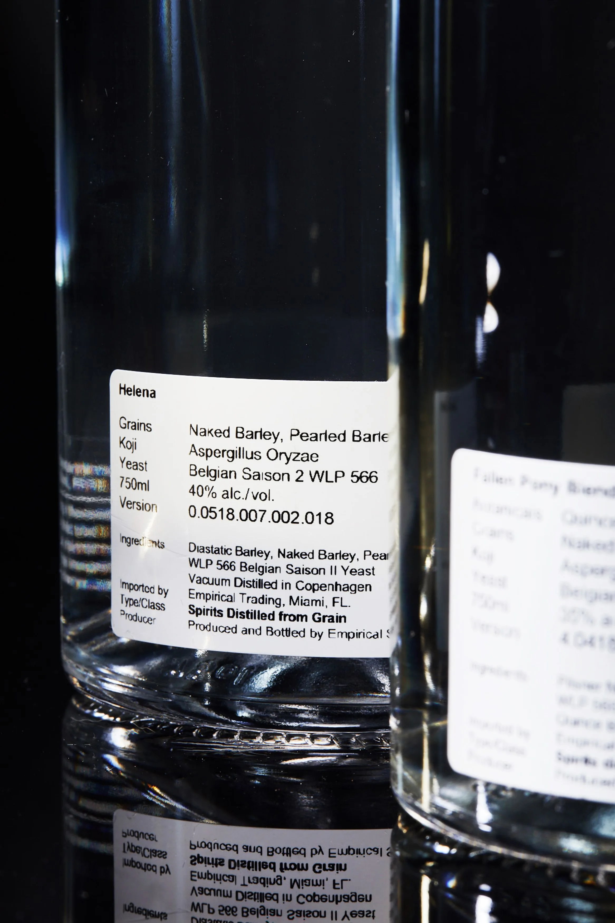 close up of a glass bottle containing a spirit made from barley
