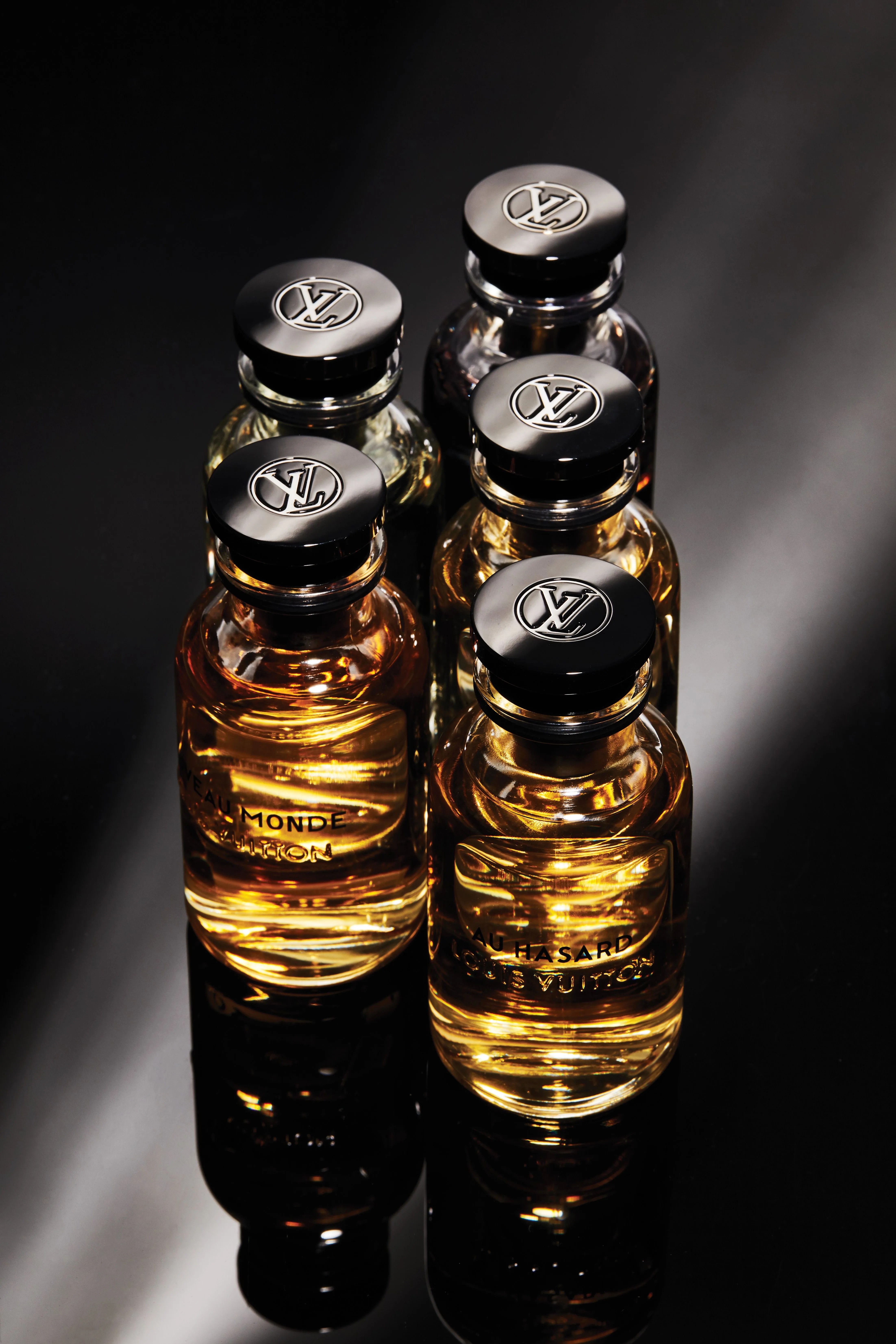 five bottles of louis vuitton cologne