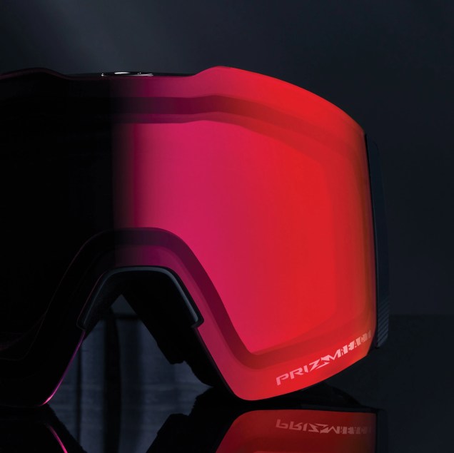 close up of oakley prizm ski goggles with red lenses