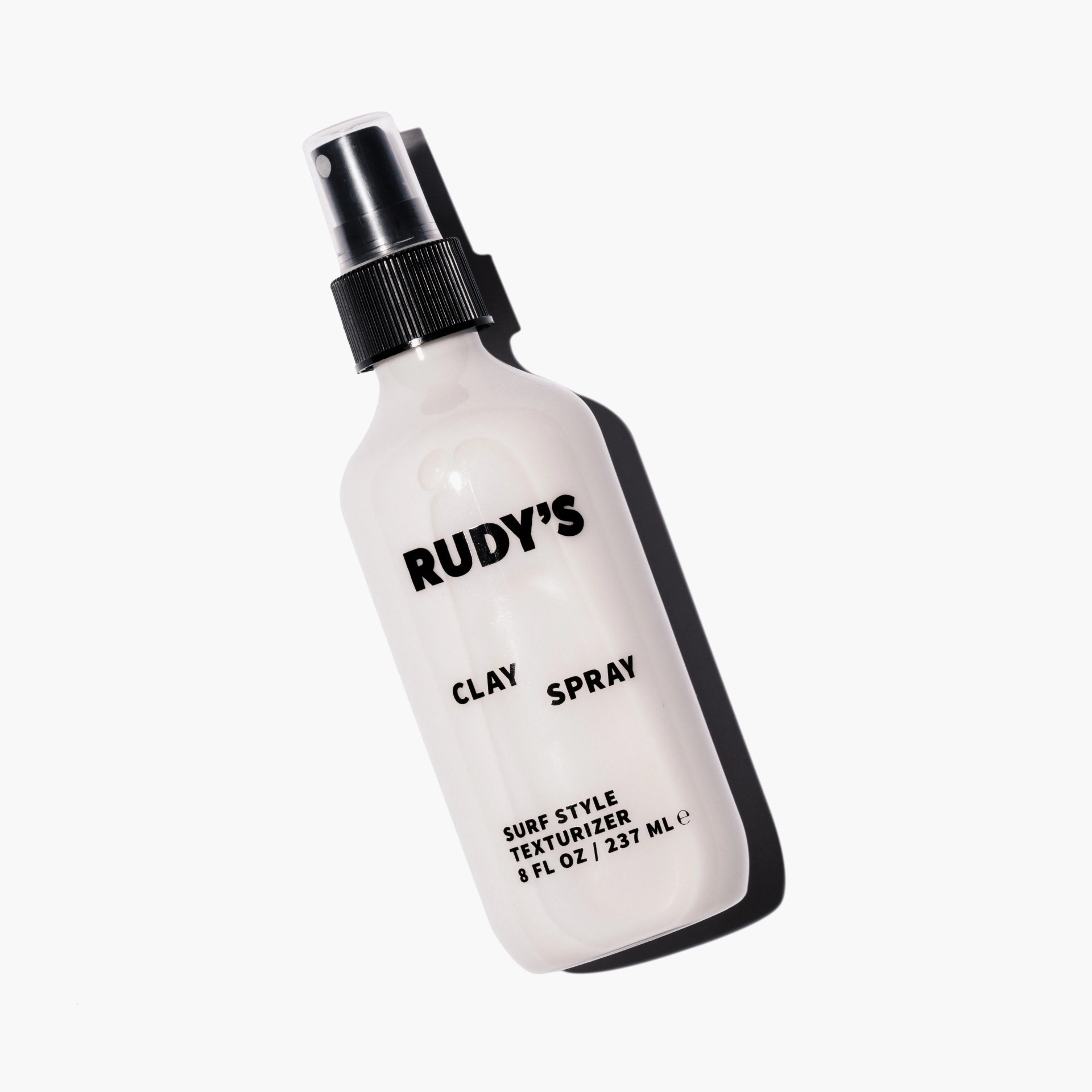 bottle of rudy's clay spray hair product