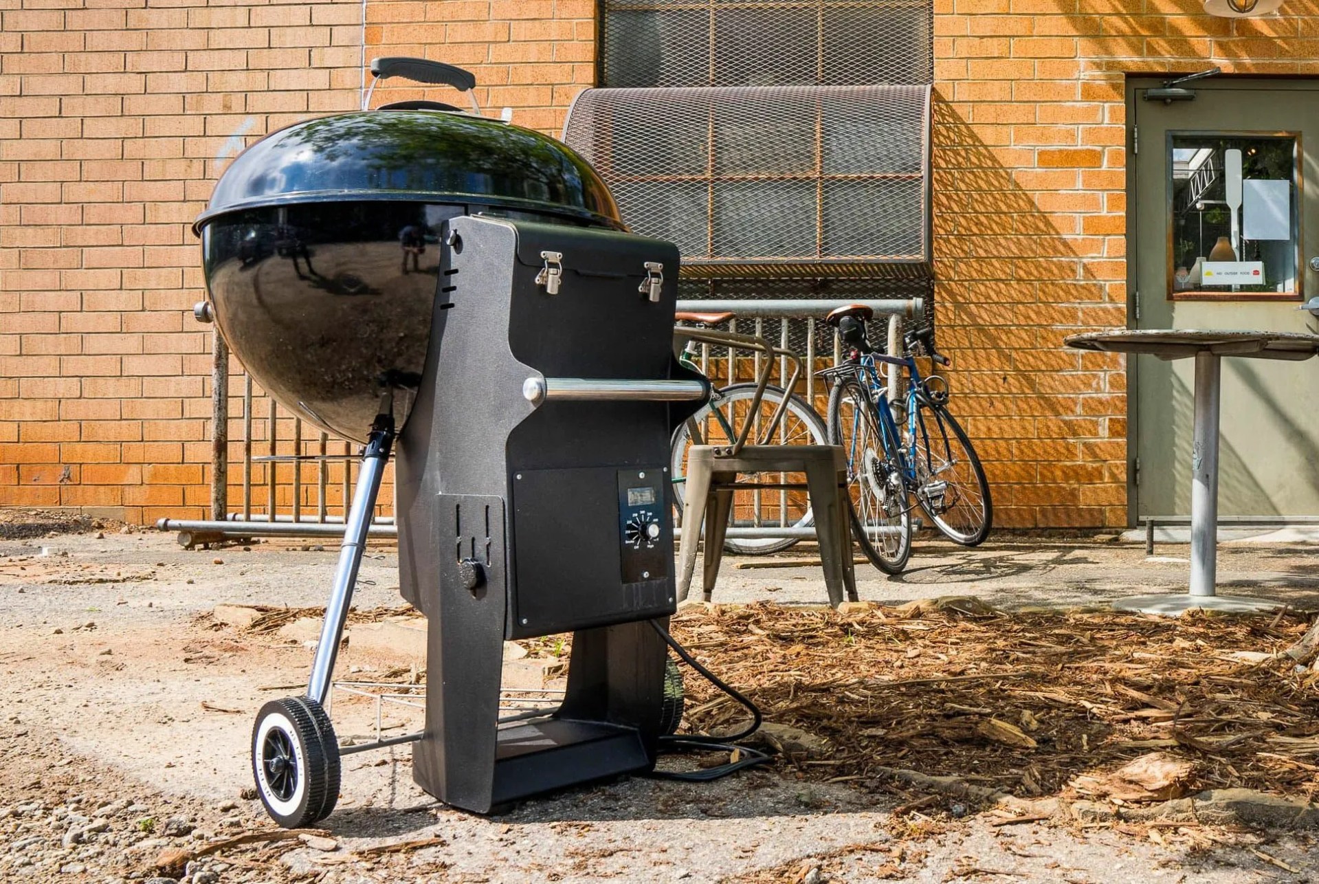 This Grill Accessory Can Turn a Cheap Weber Kettle into a State-of-the-Art Smoker