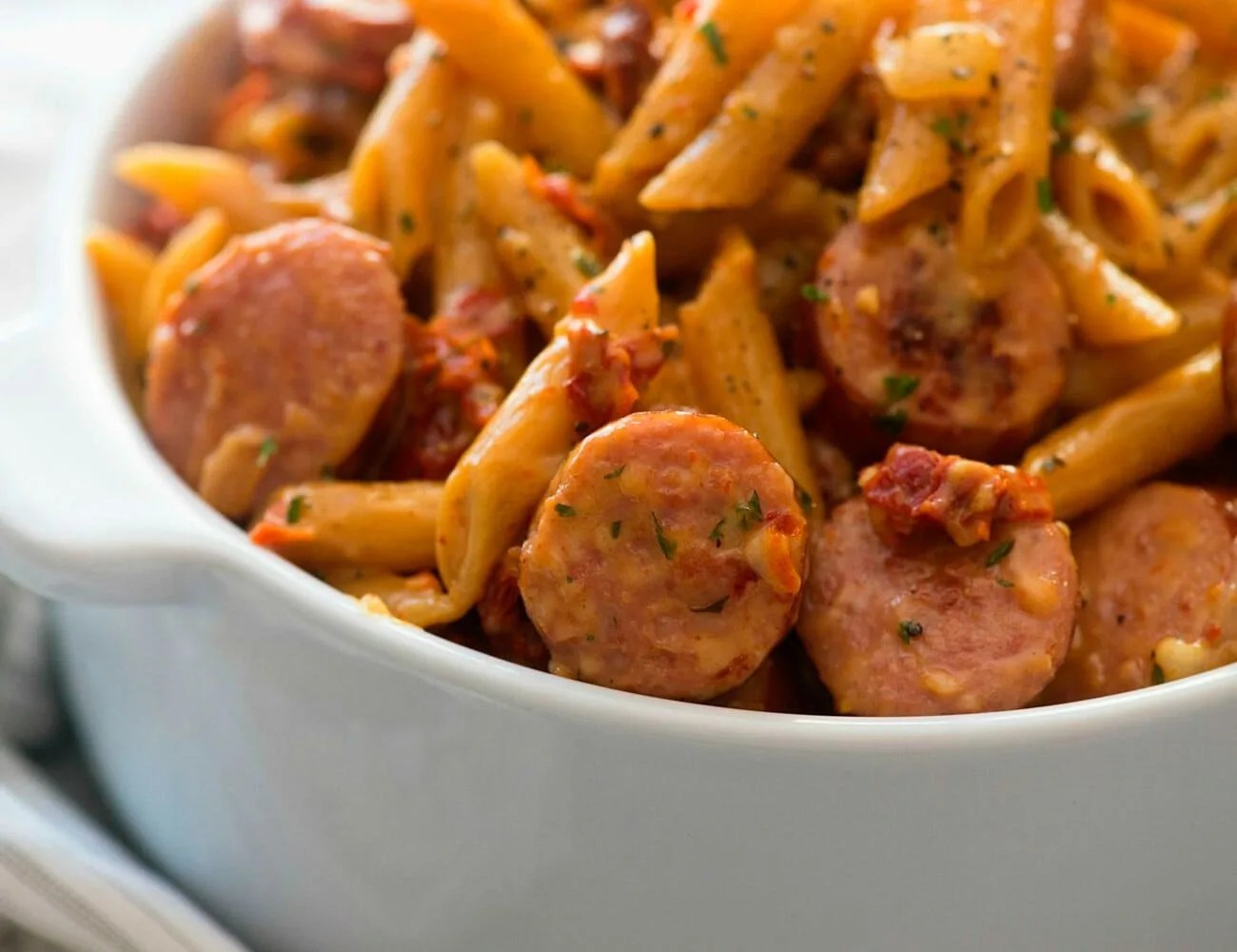 20-Dutch-Oven-Recipes-Gear-Patrol-Sundried-Tomato-Sausage-Pasta