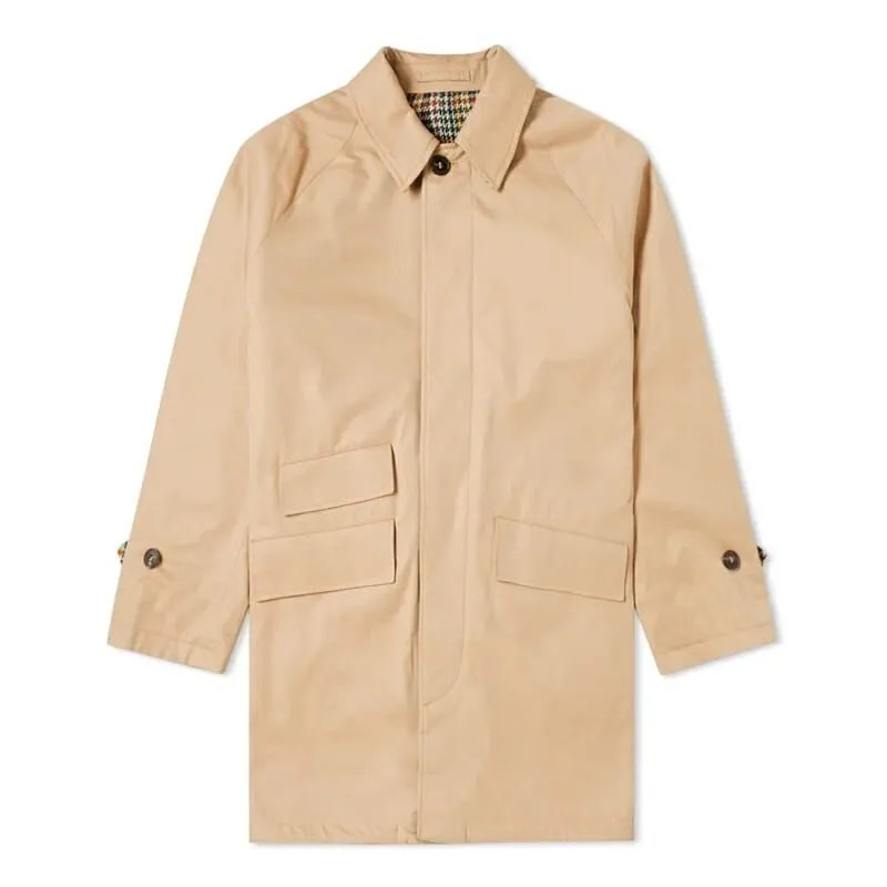 This Brand Literally Invented the Raincoat. Now Its Historic Coats Are
