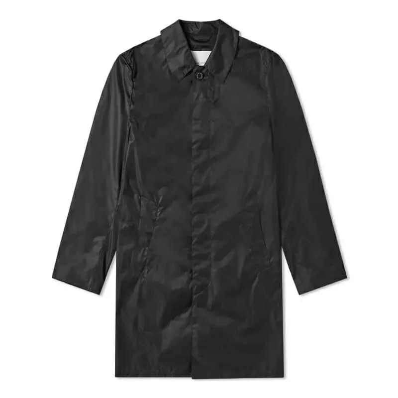 This Brand Literally Invented the Raincoat. Now Its Historic Coats Are