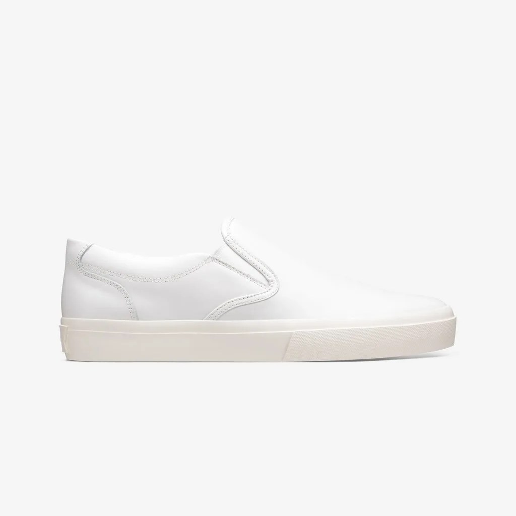 A white slip-on shoe on a white background.