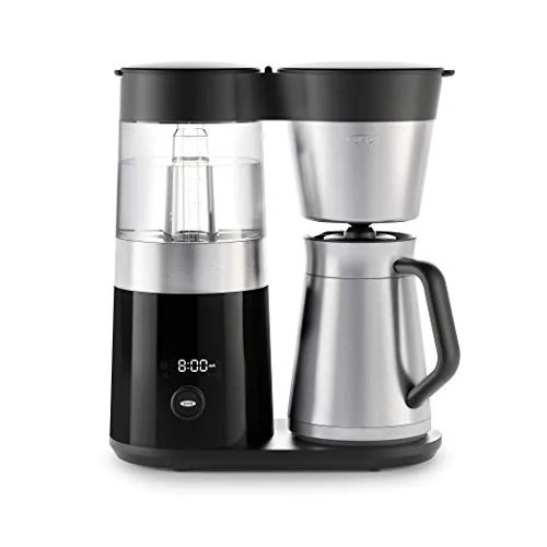 A stainless steel and black drip coffee maker on a white background.