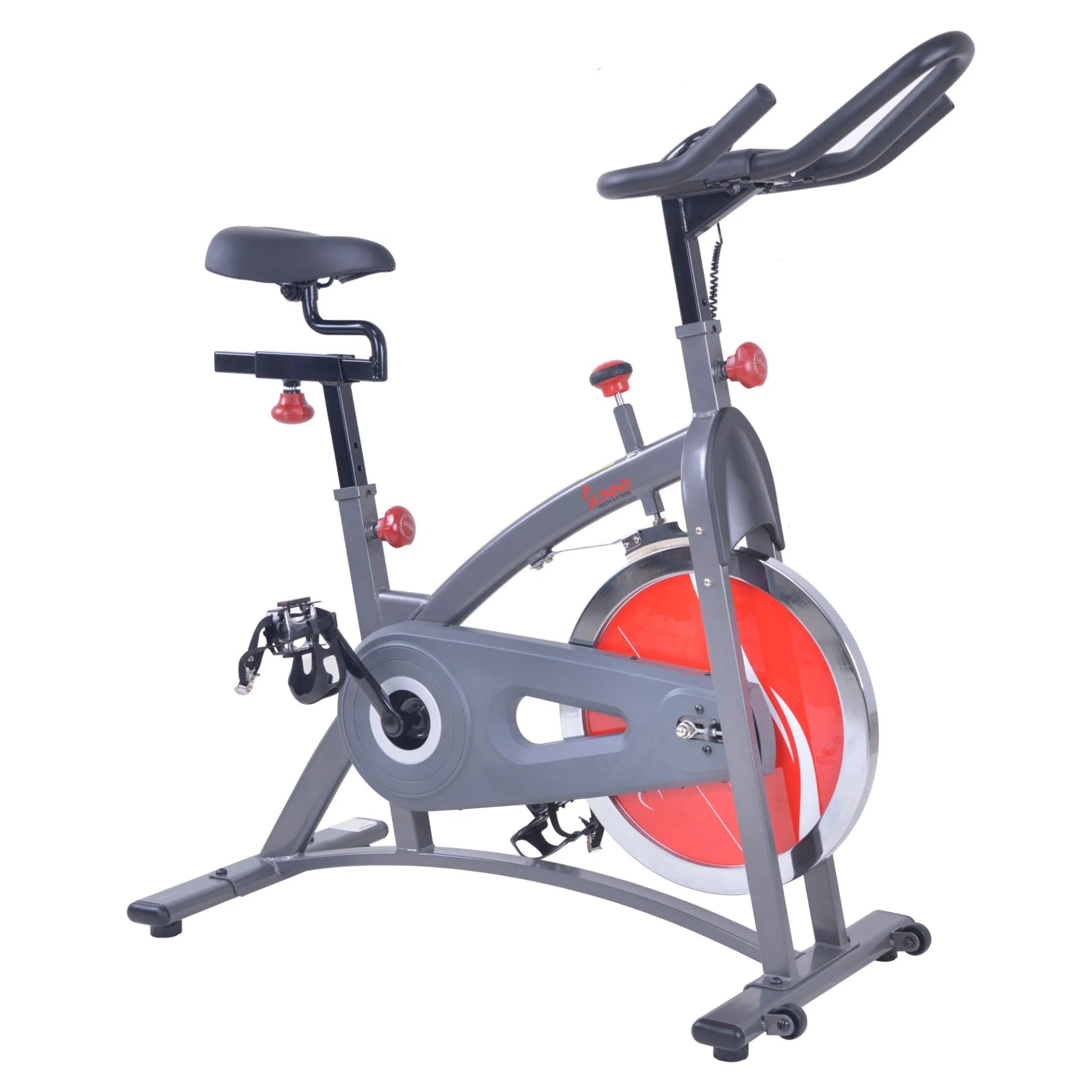 A gray indoor cycle bike with an orange wheel on a white background.
