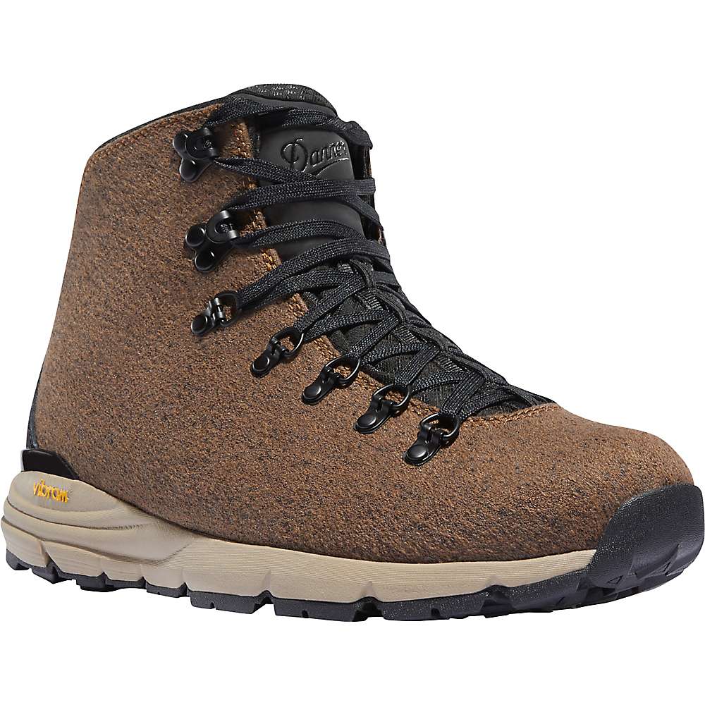 a brown hiking boot with black laces