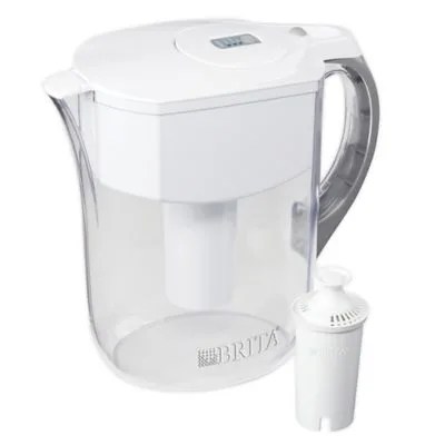 A clear and white Brita water pitcher with a white Brita filter on a white background.