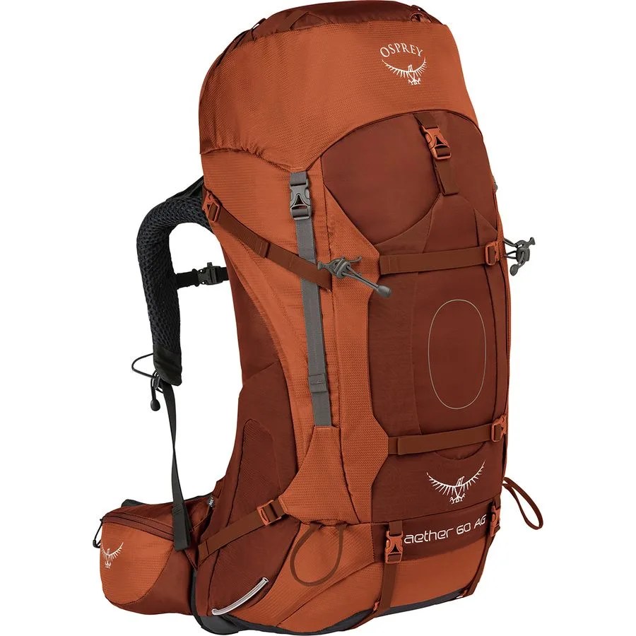 a red backpacking backpack with many straps