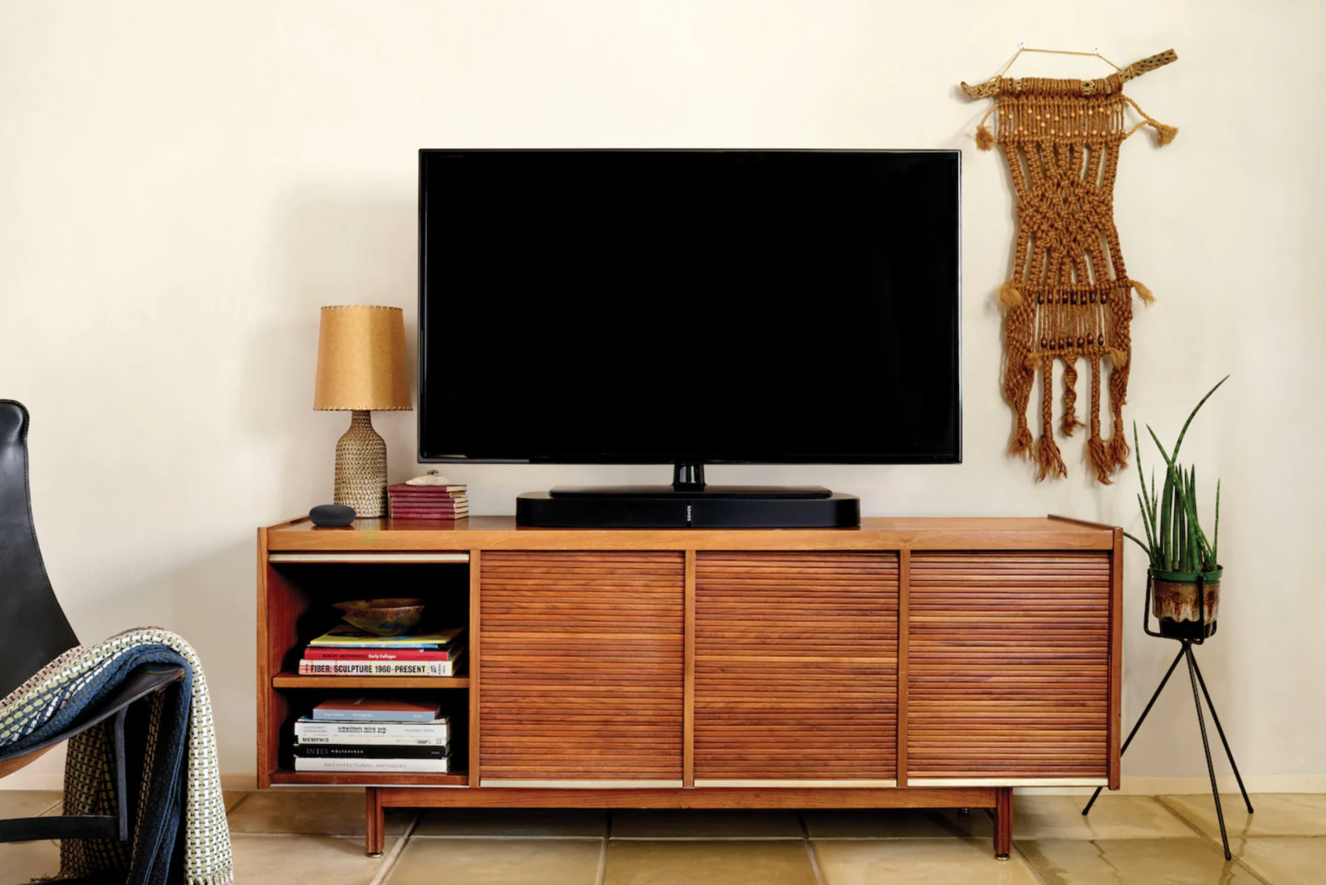a home theater system on a desk in a living room