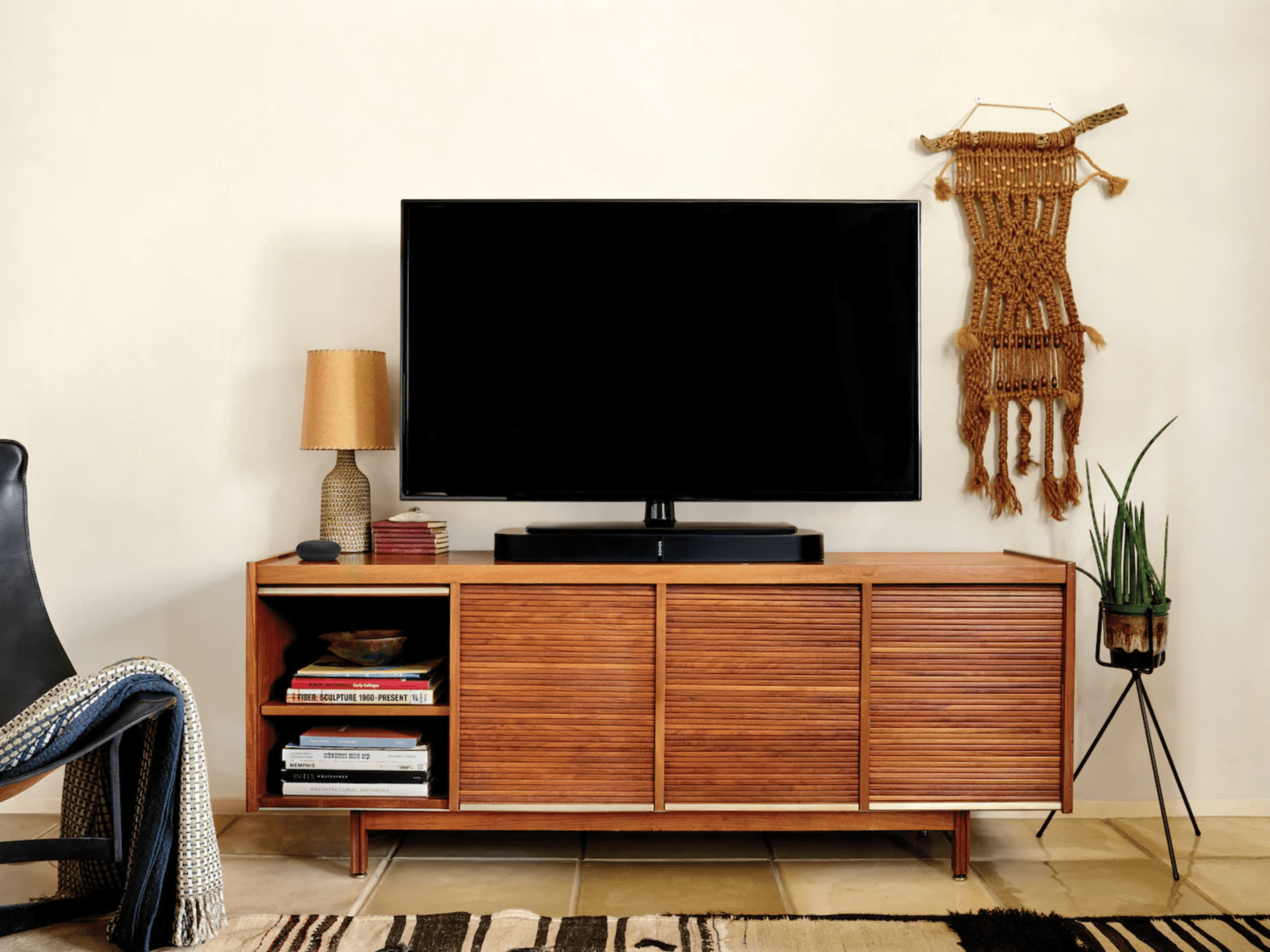 a home theater system on a desk in a living room