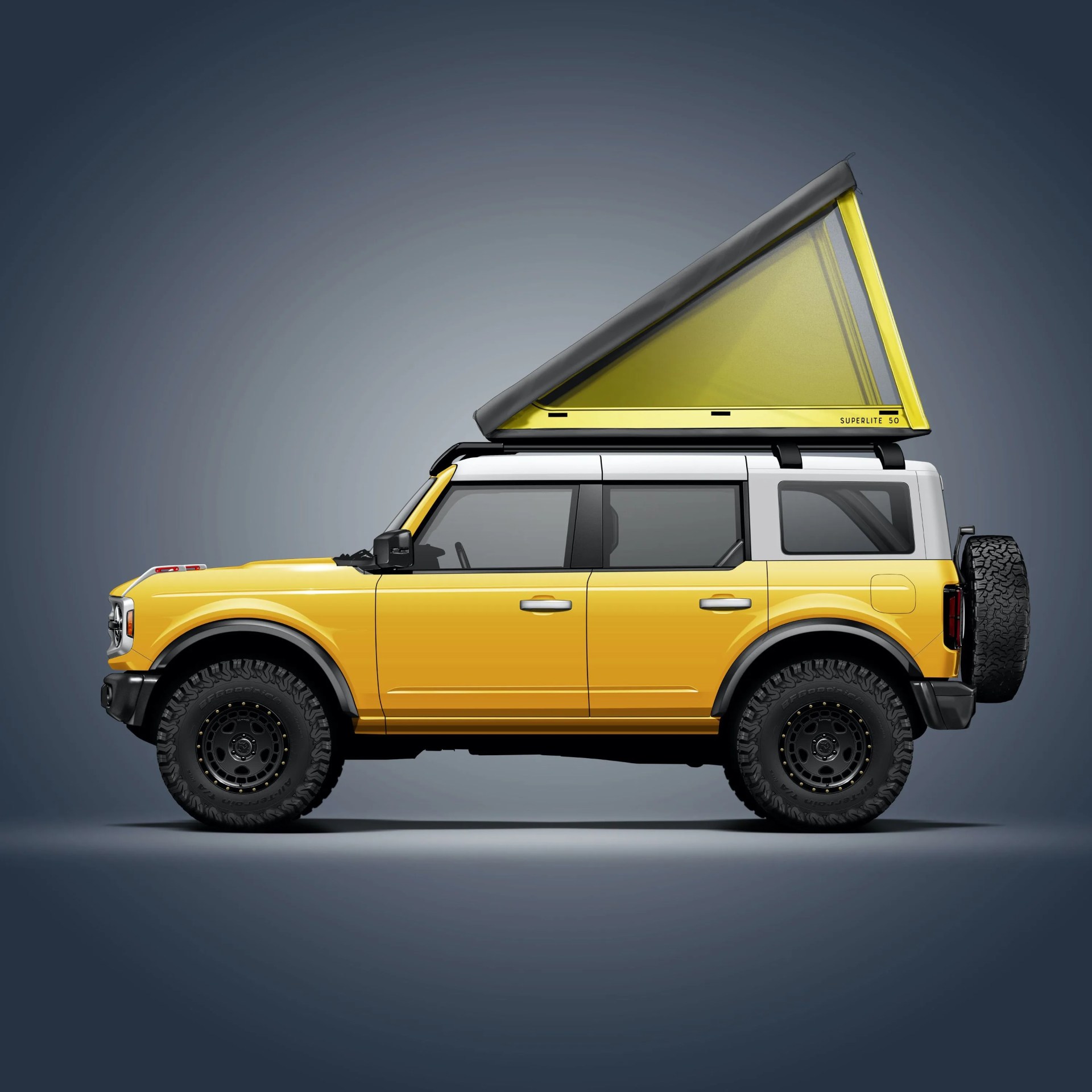 the go fast campers superlite roof tent mounted on the 2021 ford bronco in yellow