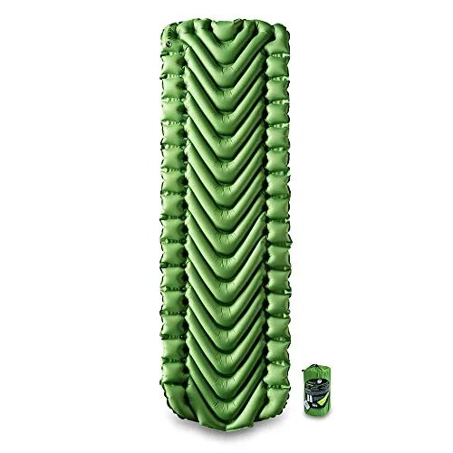 an inflated green camping mattress