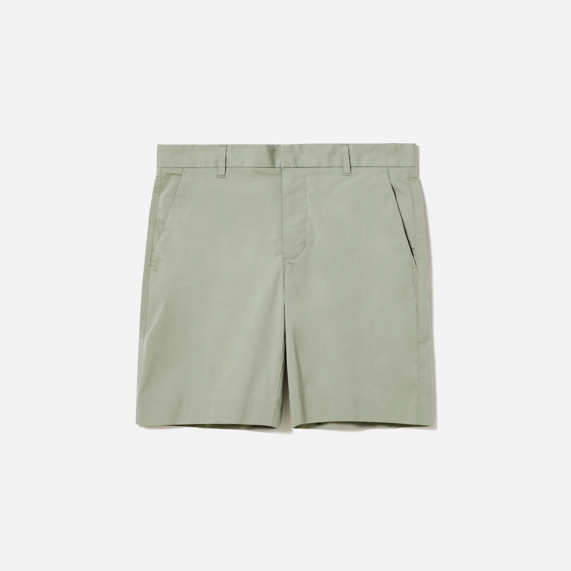 A pair of khaki shorts on a gray background.