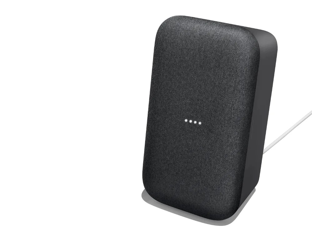 A smart speaker on a gray background.