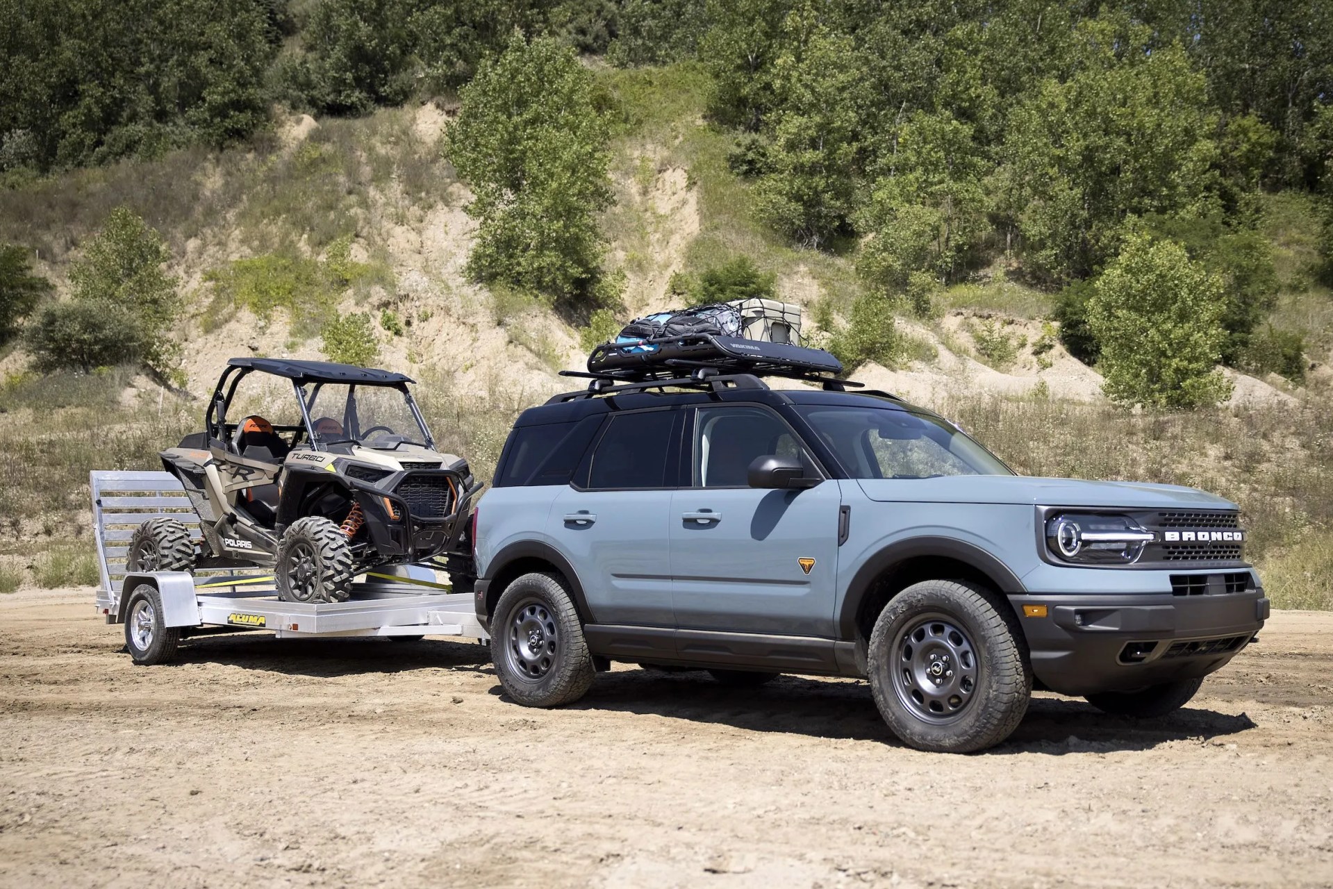 bronco sport tow rzr tow rzr matches the added passenger comfort and technology features of the badlands series with towing and cargo accessories to help adventurers haul more outdoor gear the custom build adds yakima hd bar crossbars and offgrid medium cargo basket and class ii trailer tow package with 2,200 pounds of capacity to tow off road runners like the all new polaris&reg; rzr xp turbo 1000&trade;, unveiled today as part of the bronco birthday celebration preproduction image with optional features shown available late 2020
