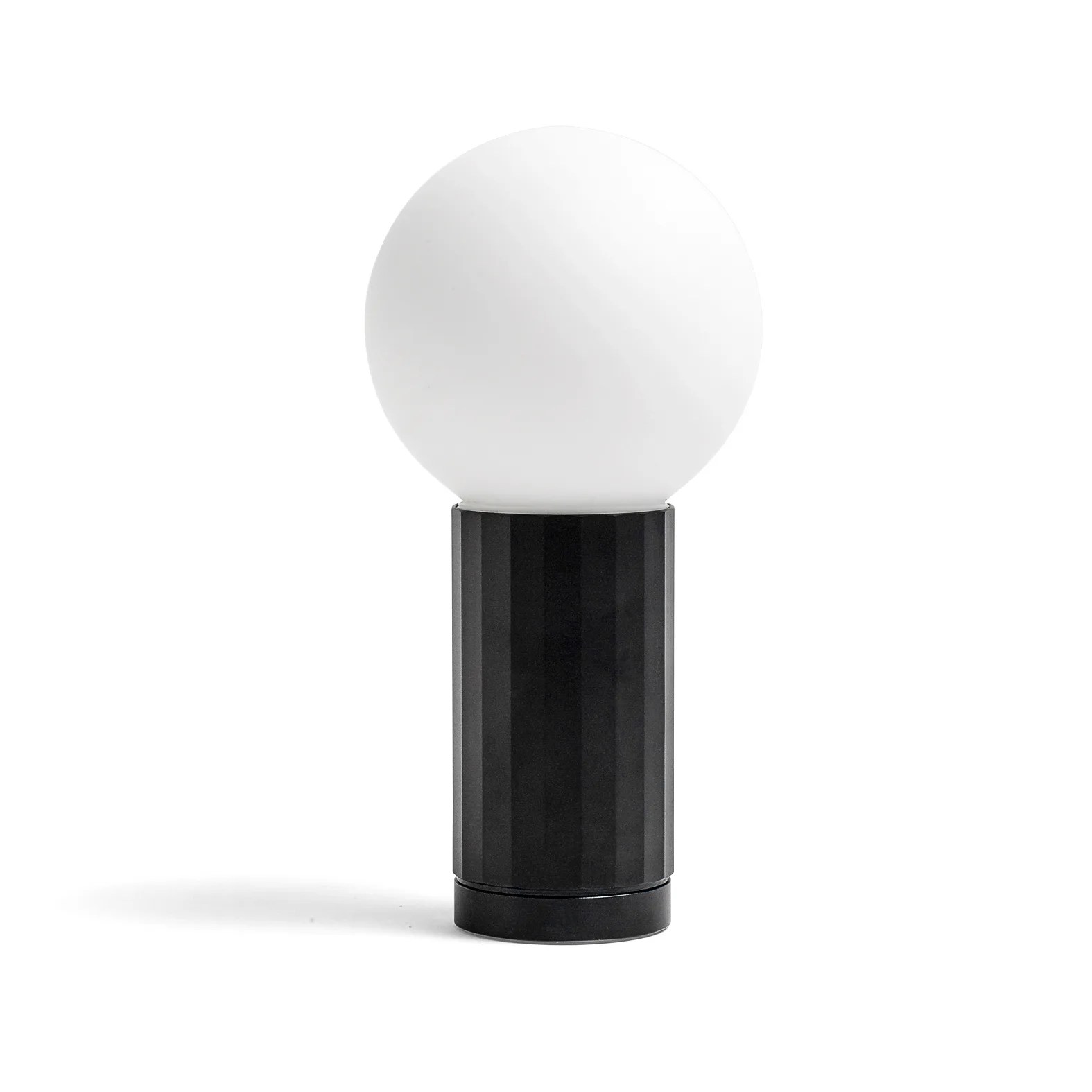 A black and white globe lamp on a gray background.