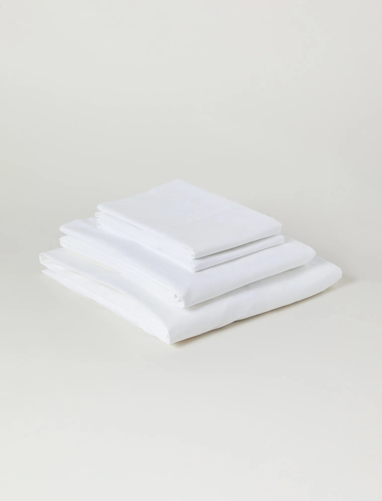 A white bed sheet set.