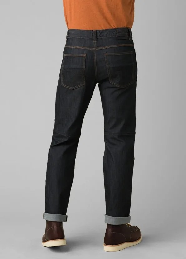 A model wearing a pair of blue jeans.