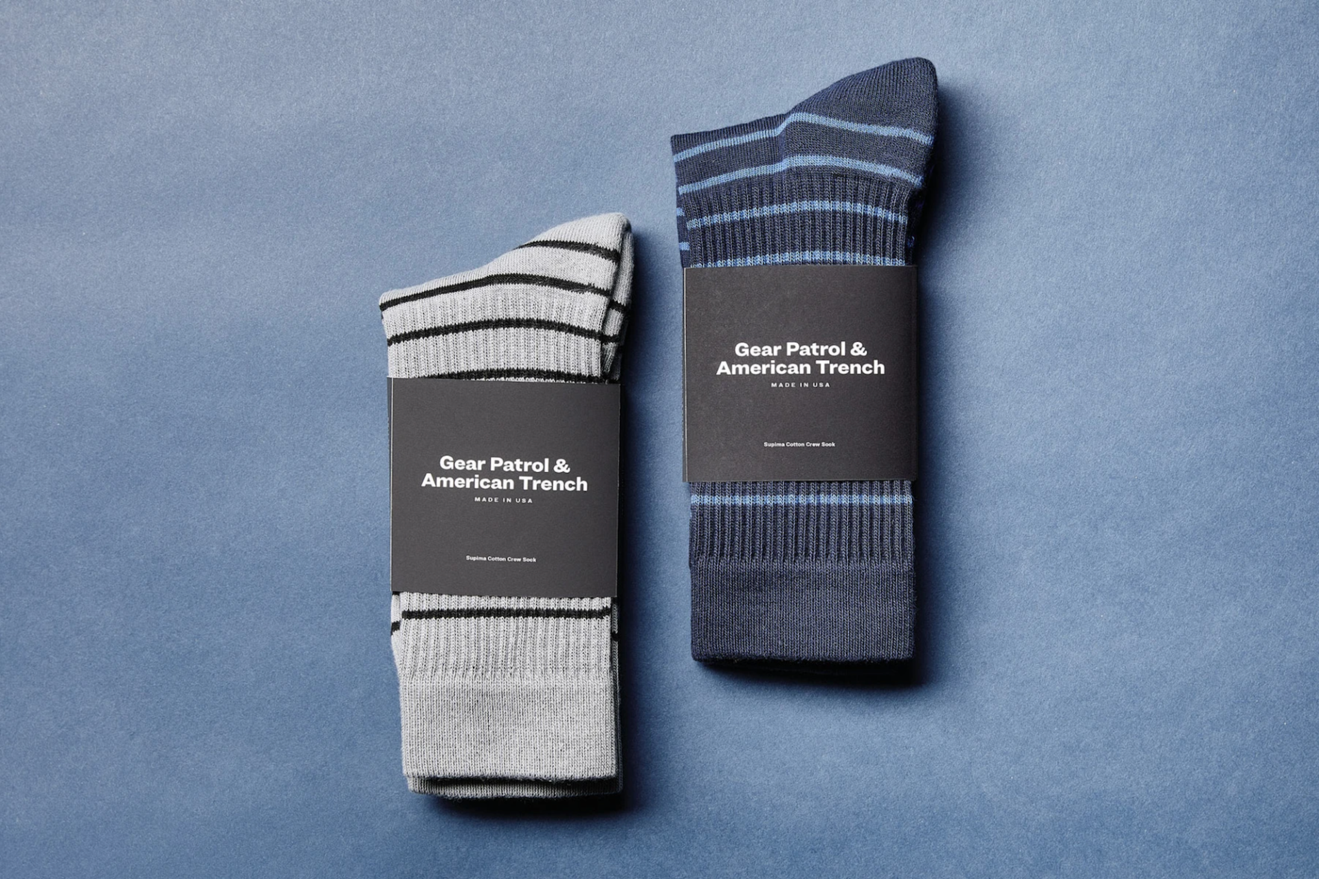 a pair of striped socks on a blue background