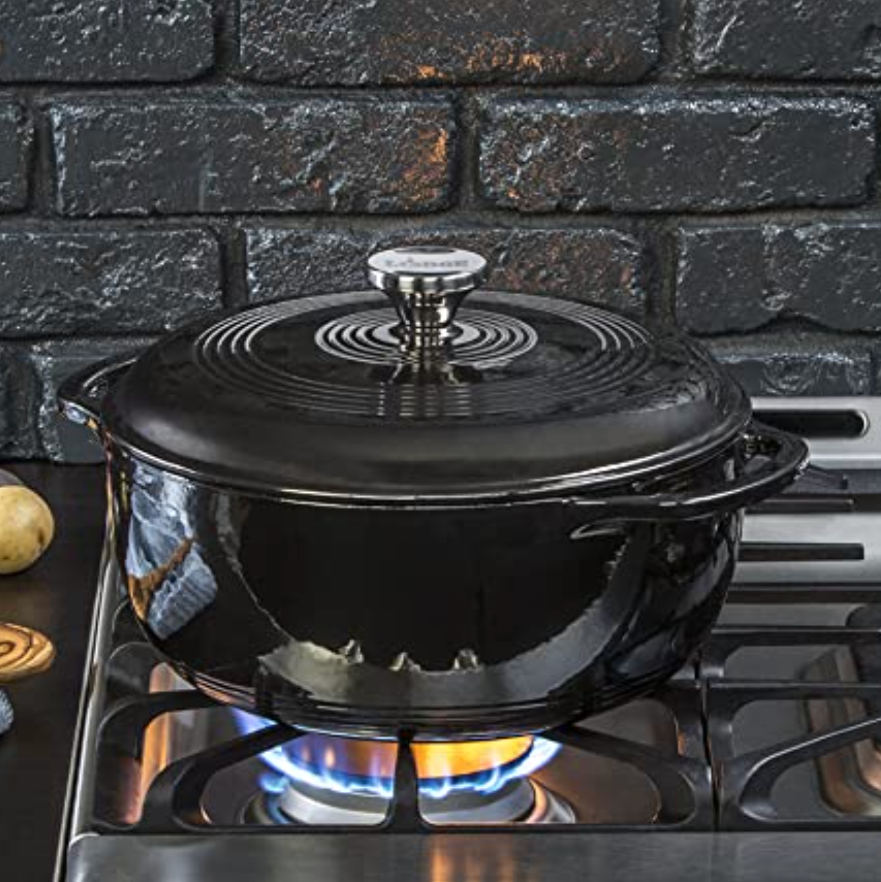 a black dutch oven on a stove top