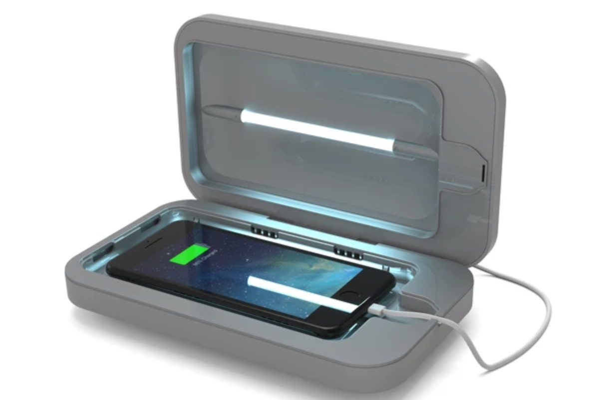 a gray smartphone uv sanitizer with a phone on a white background