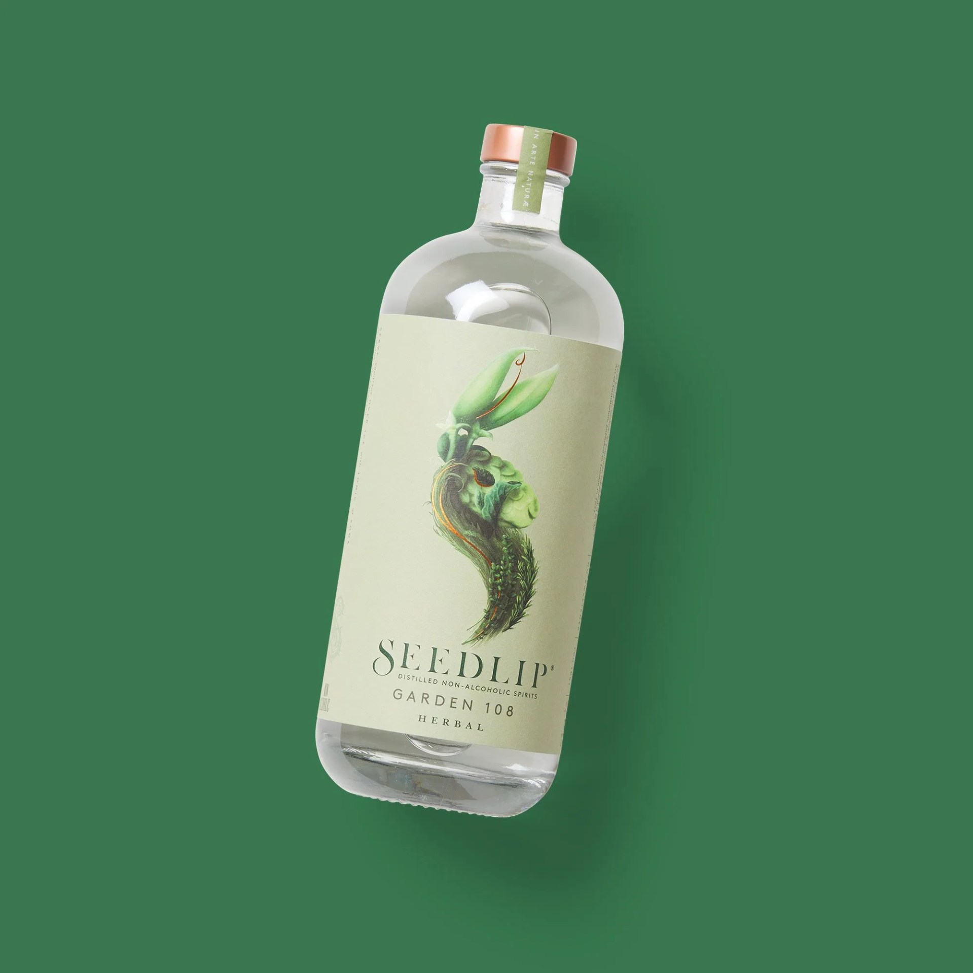 bottle with a wooden top and illustration of a bunny that looks like it's made from plants