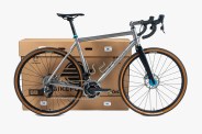 a bike next to a big cardboard box