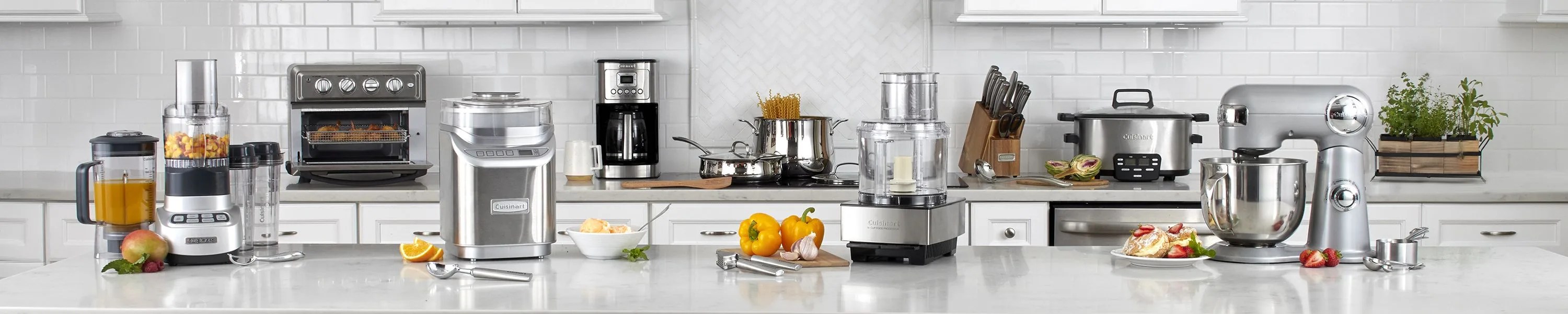 a bunch of cuisinart appliances in a kitchen