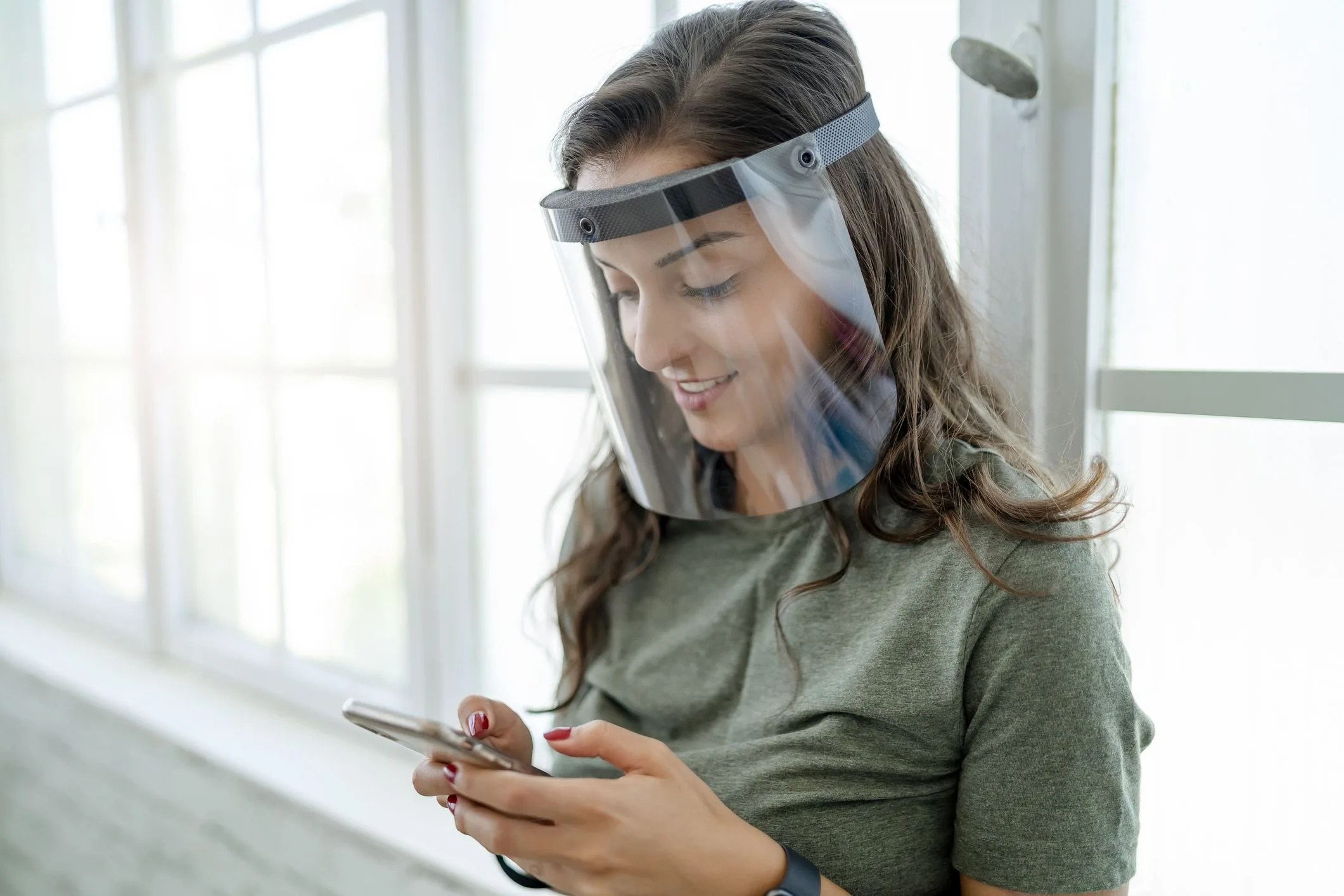 women wear mask and face shield to protect themselves