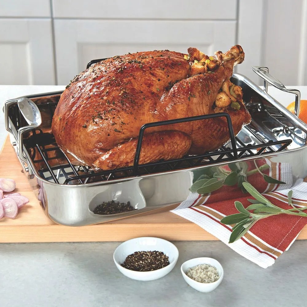 A roasting pan w/ a turkey in it