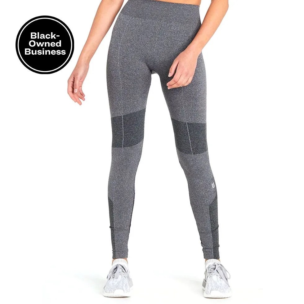 a woman wearing gray leggings