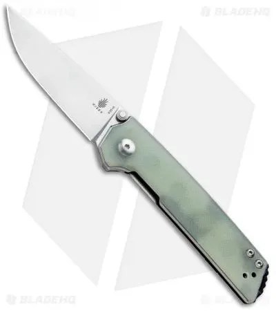 a pocket knife with a light green handle