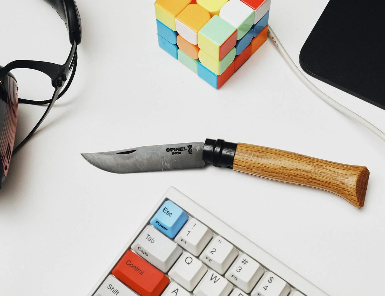 a pocket knife on a desk