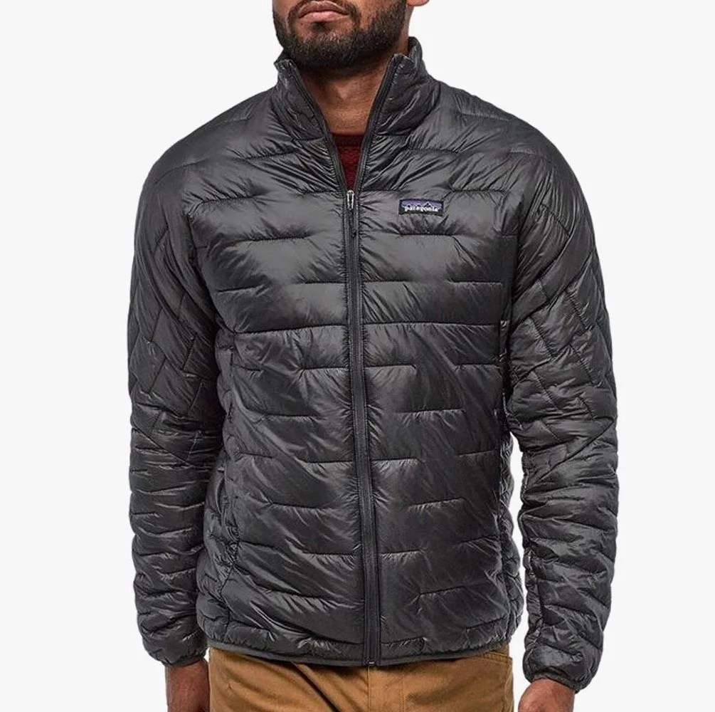 a man wearing a black insulated jacket