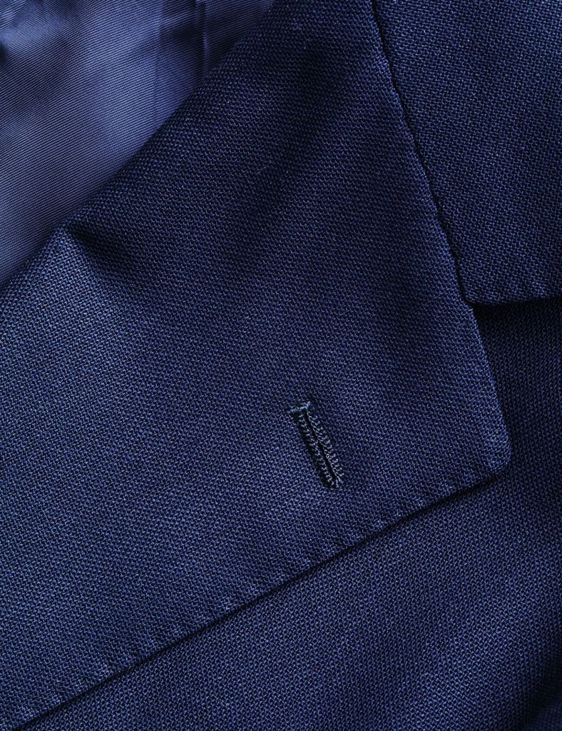 Why Do Suits Have a Random Buttonhole on the Lapel? We Found Out Gear