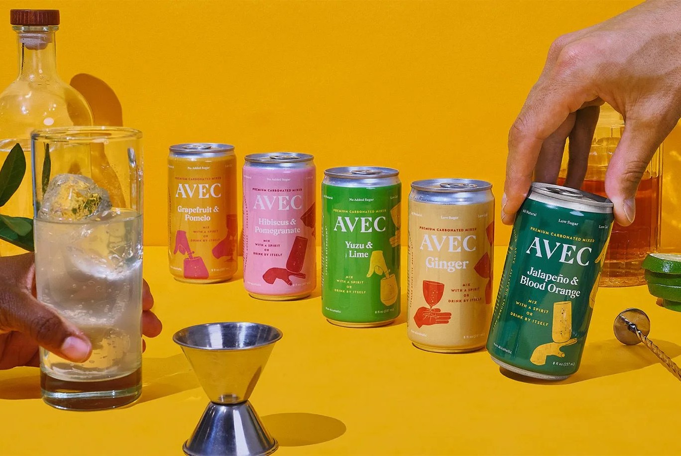cans of soda and glass