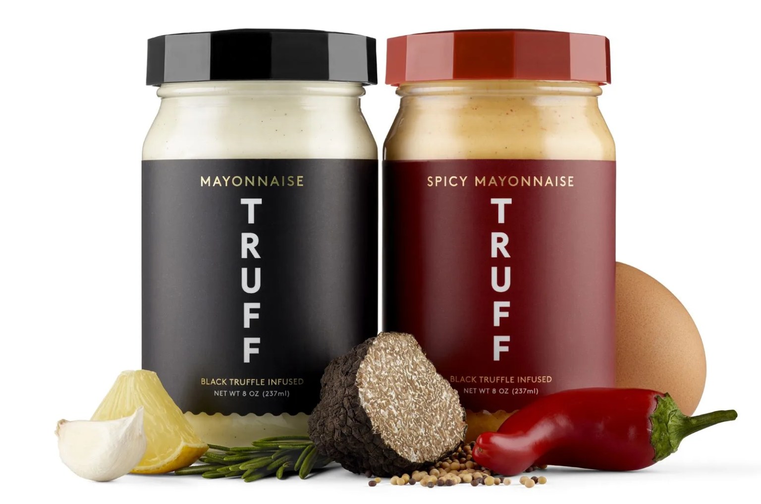 jar of mayo next to jar of spicy mayo surrounded by ingredients