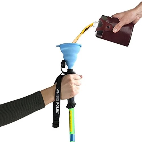 a hand pouring alcohol into a ski pole