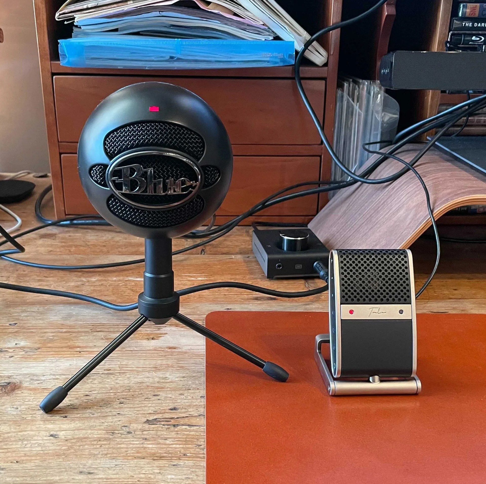 black snowball mic and tula mic