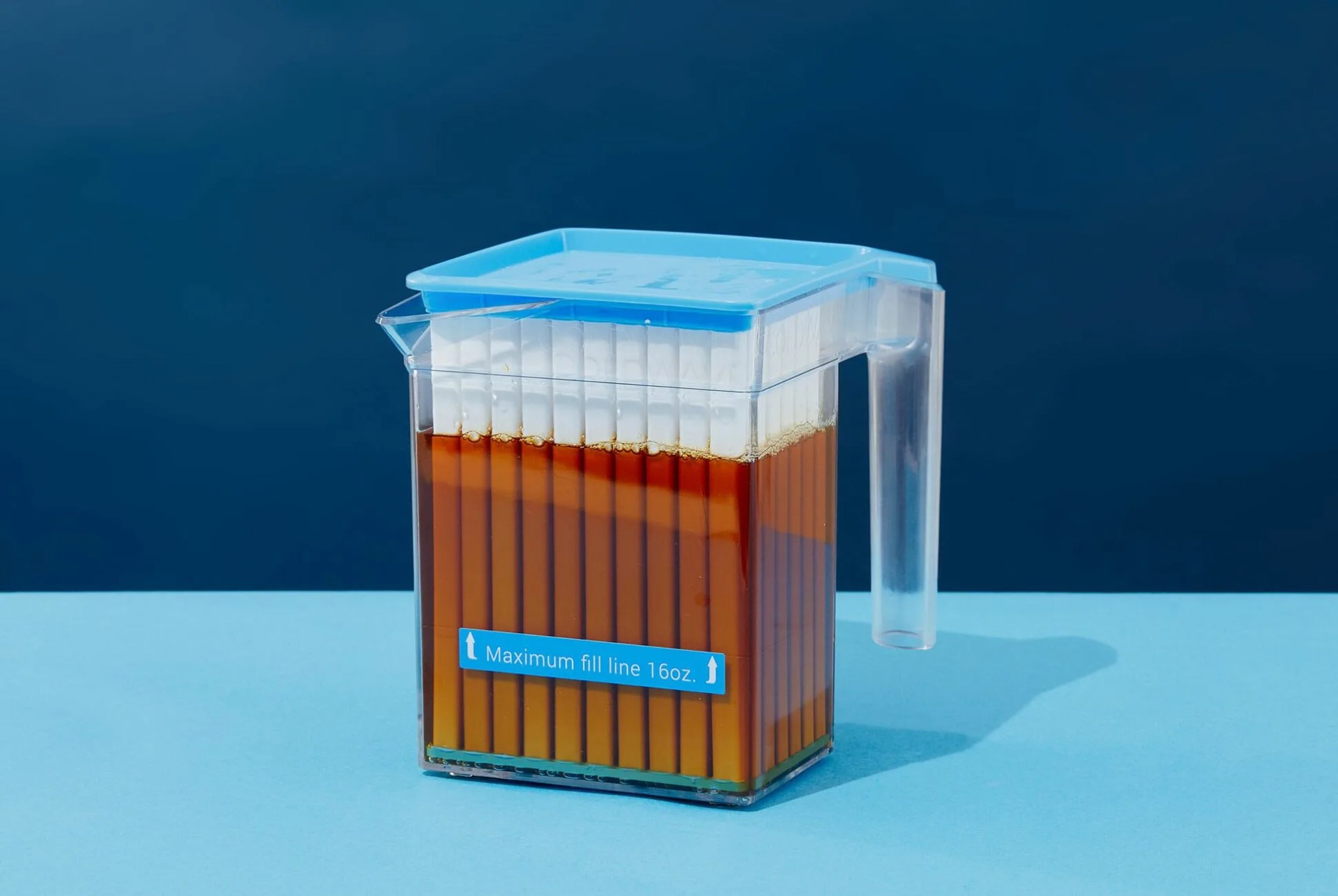 The Snapchill Coldwave iced coffee pitcher shown fully sitting on a blue background.