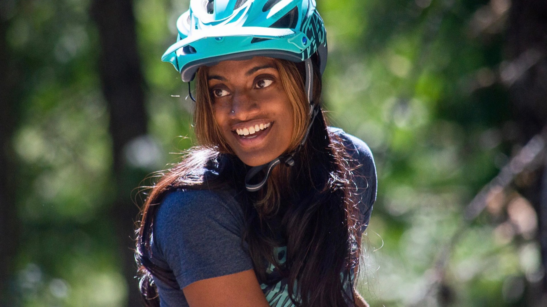anita naidu wearing a bike helmet