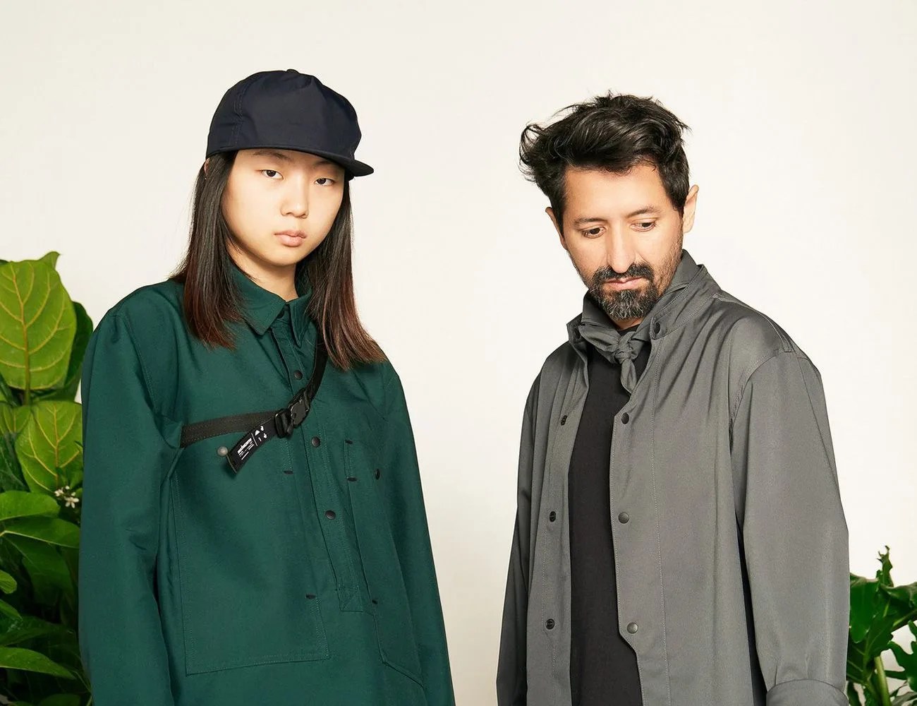 woman and man modeling jackets