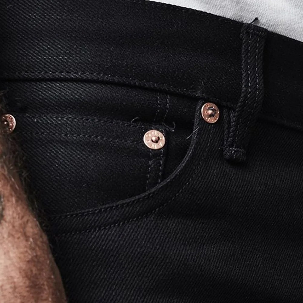 man wearing black jeans