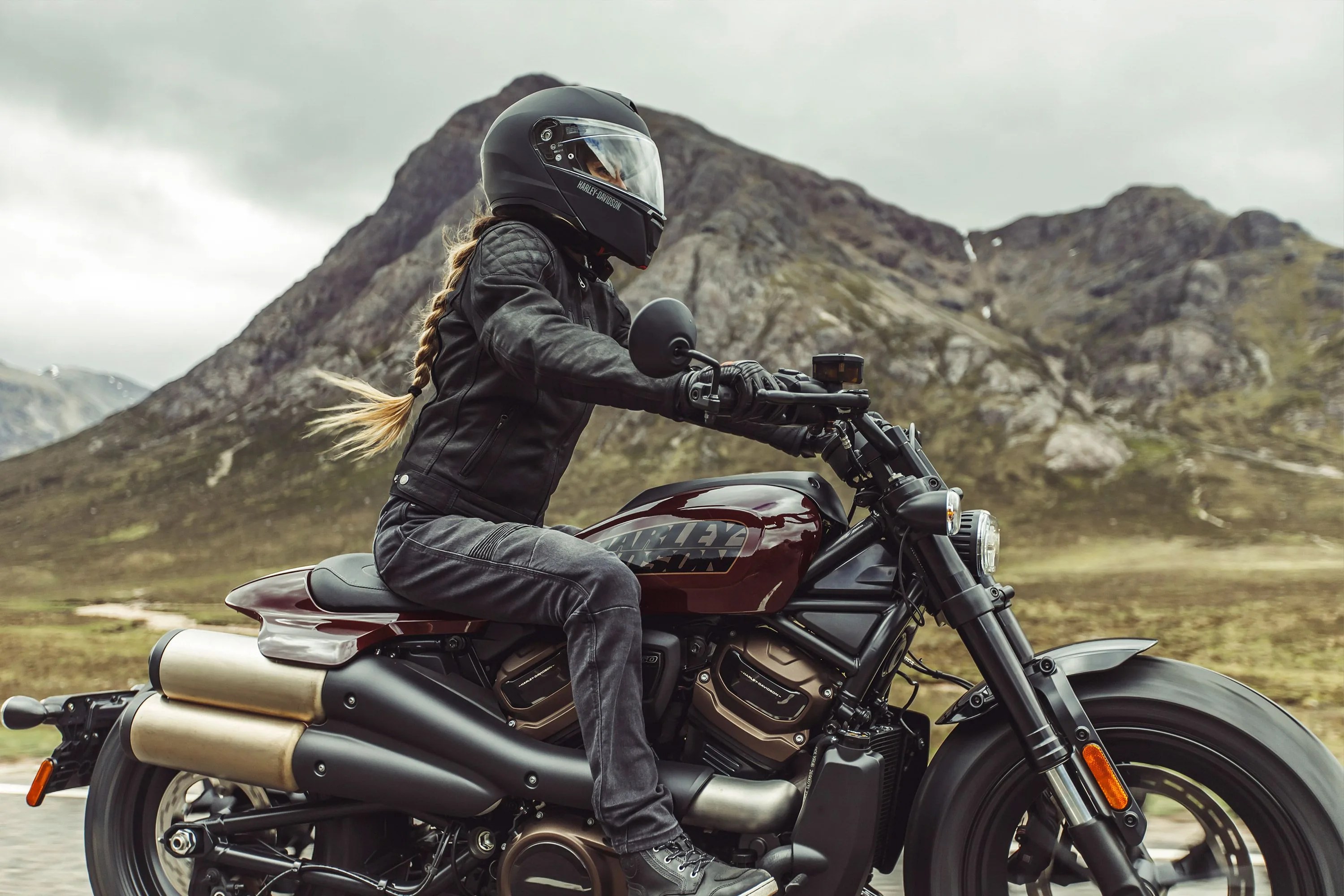 woman riding harley davidson sportster s