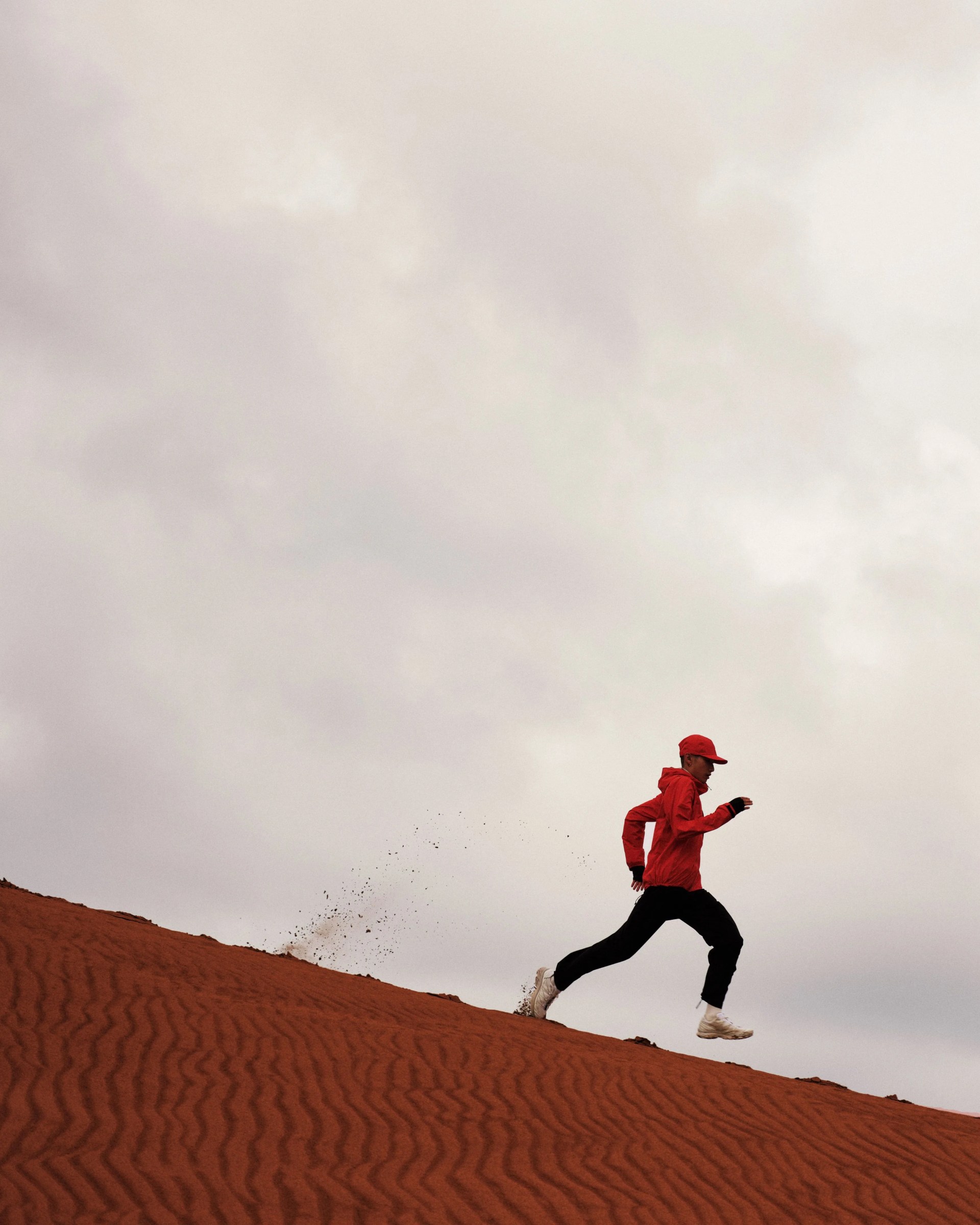 man running wearing goldwin shell